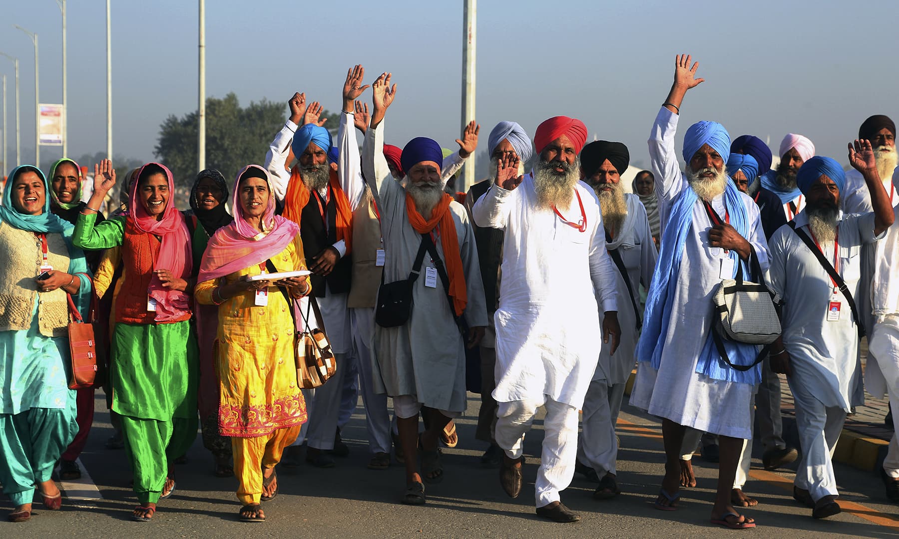 Sikh pilgrims arrive to visit the shrine of Guru Nanak Dev Ji at Gurdwara Darbar Sahib in Kartarpur, Pakistan.