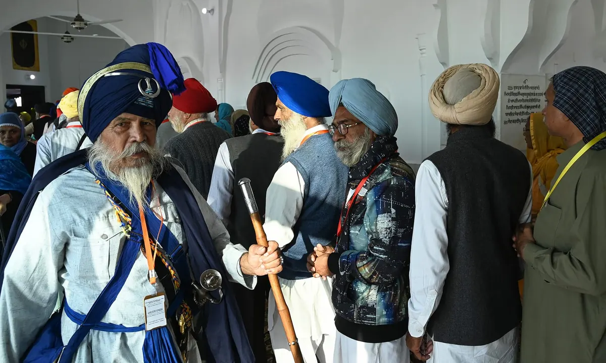 Sikh pilgrims visit the shrine of Guru Nanak Dev Ji at Gurdwara Darbar Sahib, near the Pakistan-India border.